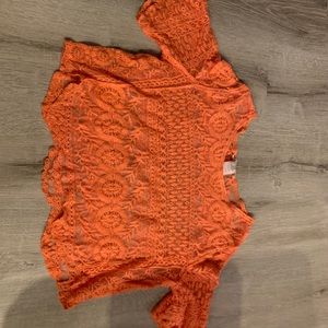 Bat sleeve over shirt